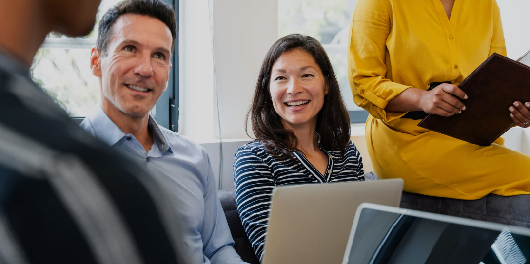 Individuals waiting for meeting to start