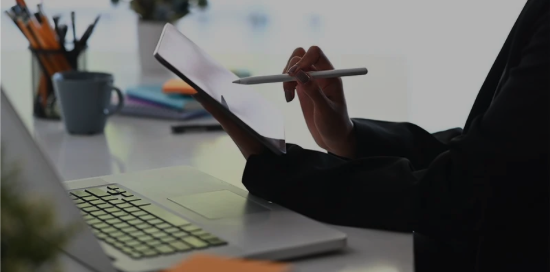 Working on a document by laptop