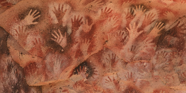Cave painting of many hands