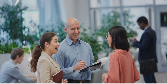 People talking in an modern office foyer