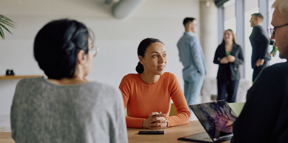 a-diverse-team-of-business-professionals-engaged a-diverse-team-of-business-professionals-engaged