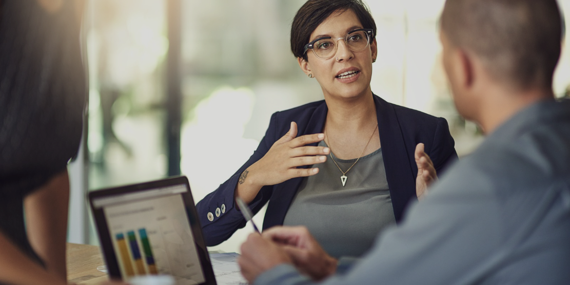 colleagues-having-a-discussion-in-a-boardroom